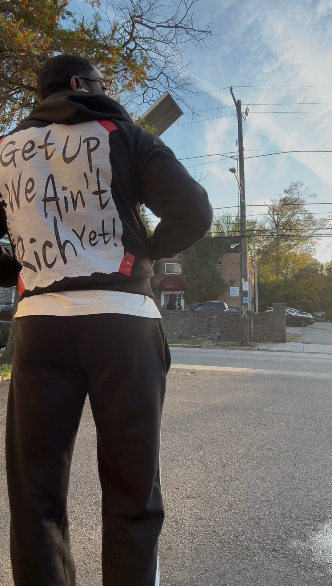 “Get up we ain’t rich yet” hoodies. Christopher Nicole